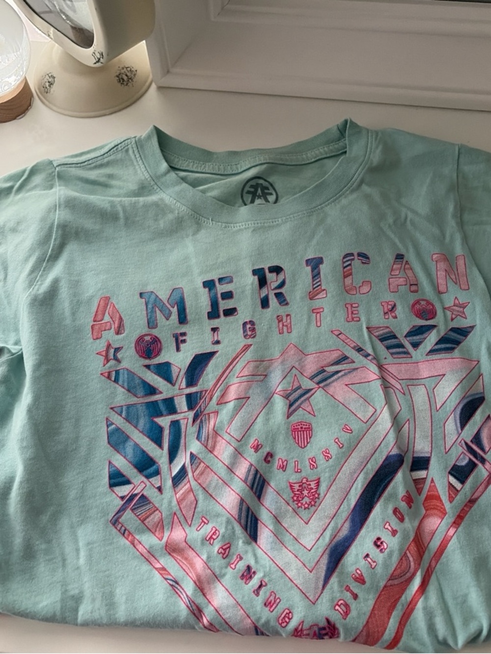 Buckle women’s Mint Green Tee with Pink & Navy Graphic
